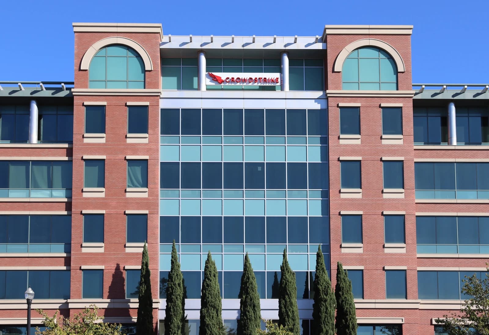 CrowdStrike logo and name visible on the top of their corporate building.