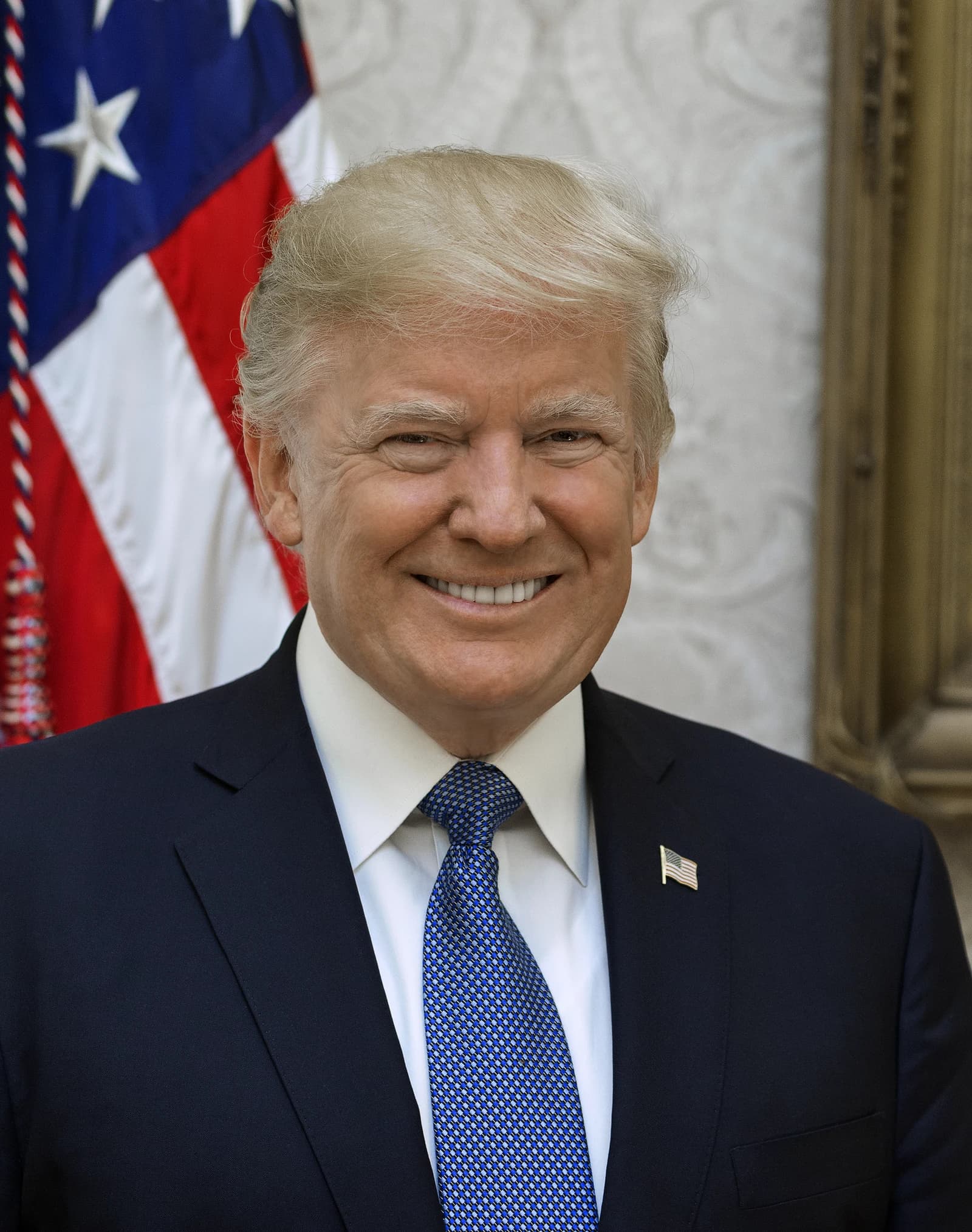 Donald Trump, former U.S. President, smiling in an official portrait.