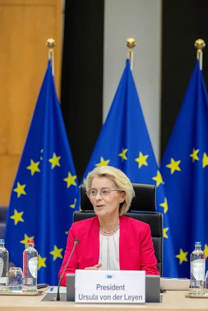 Ursula von der Leyen, President of the European Commission, speaking from a podium.