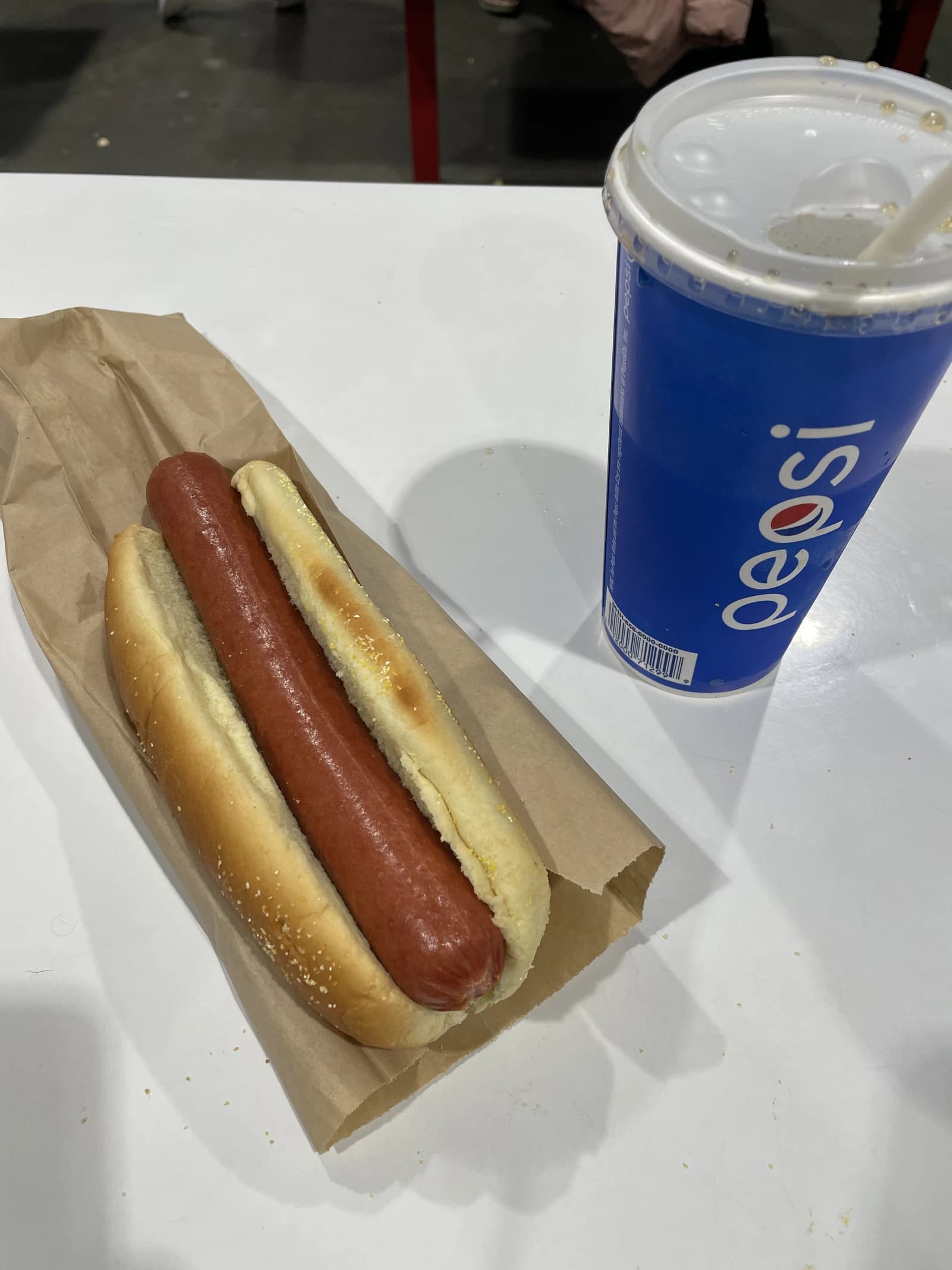 Hot dog and Pepsi soda in a Costco food court in Queens, New York.