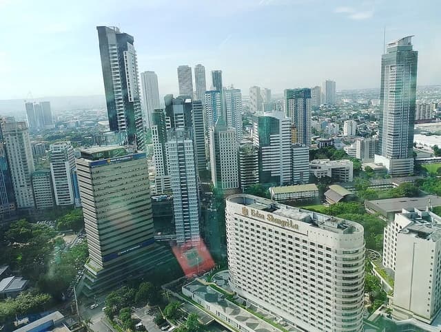 Aerial view of Bank of Commerce building and Edsa Shangri-La hotel in Manila.
