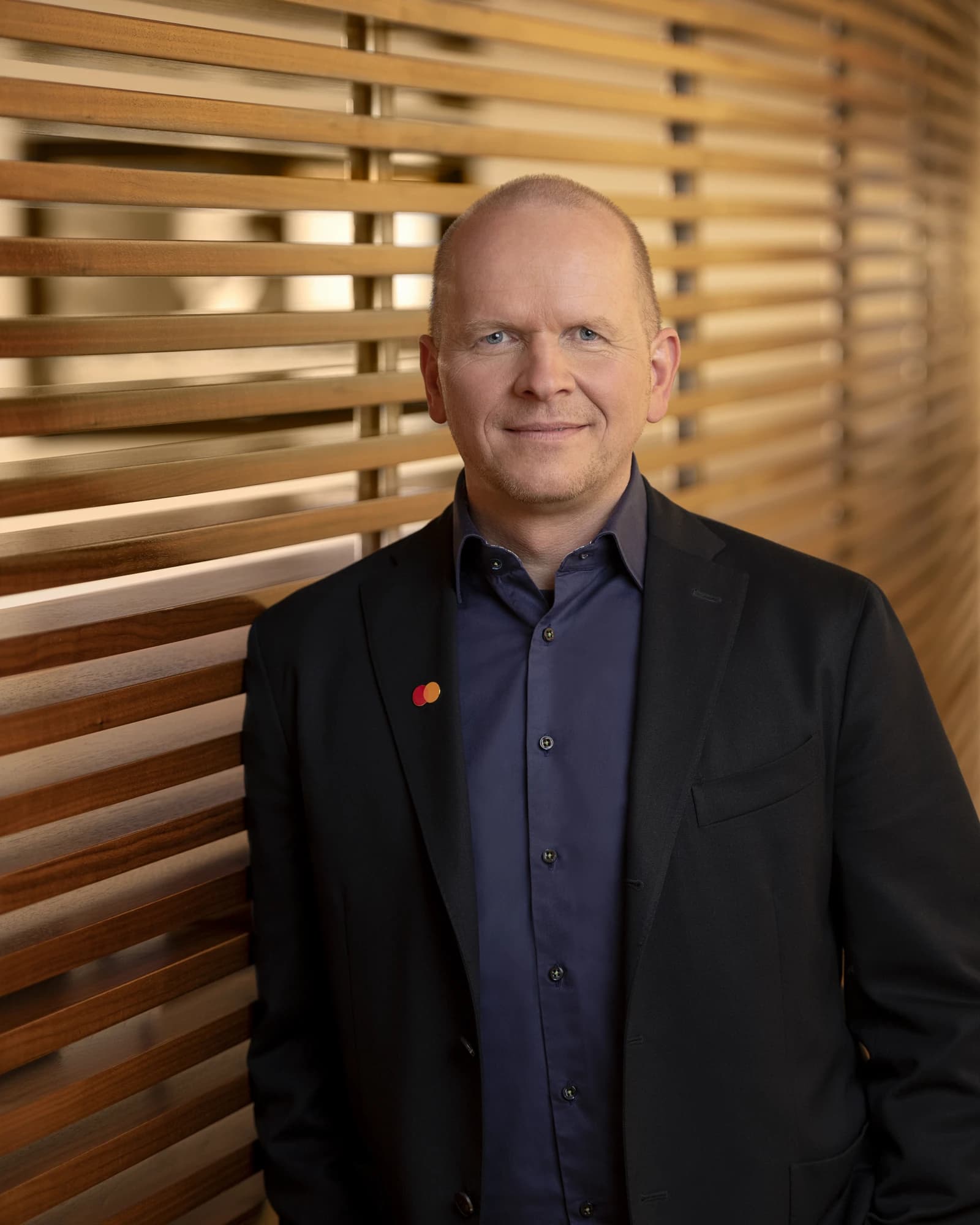 Michael Miebach, CEO of Mastercard, standing in a professional portrait.