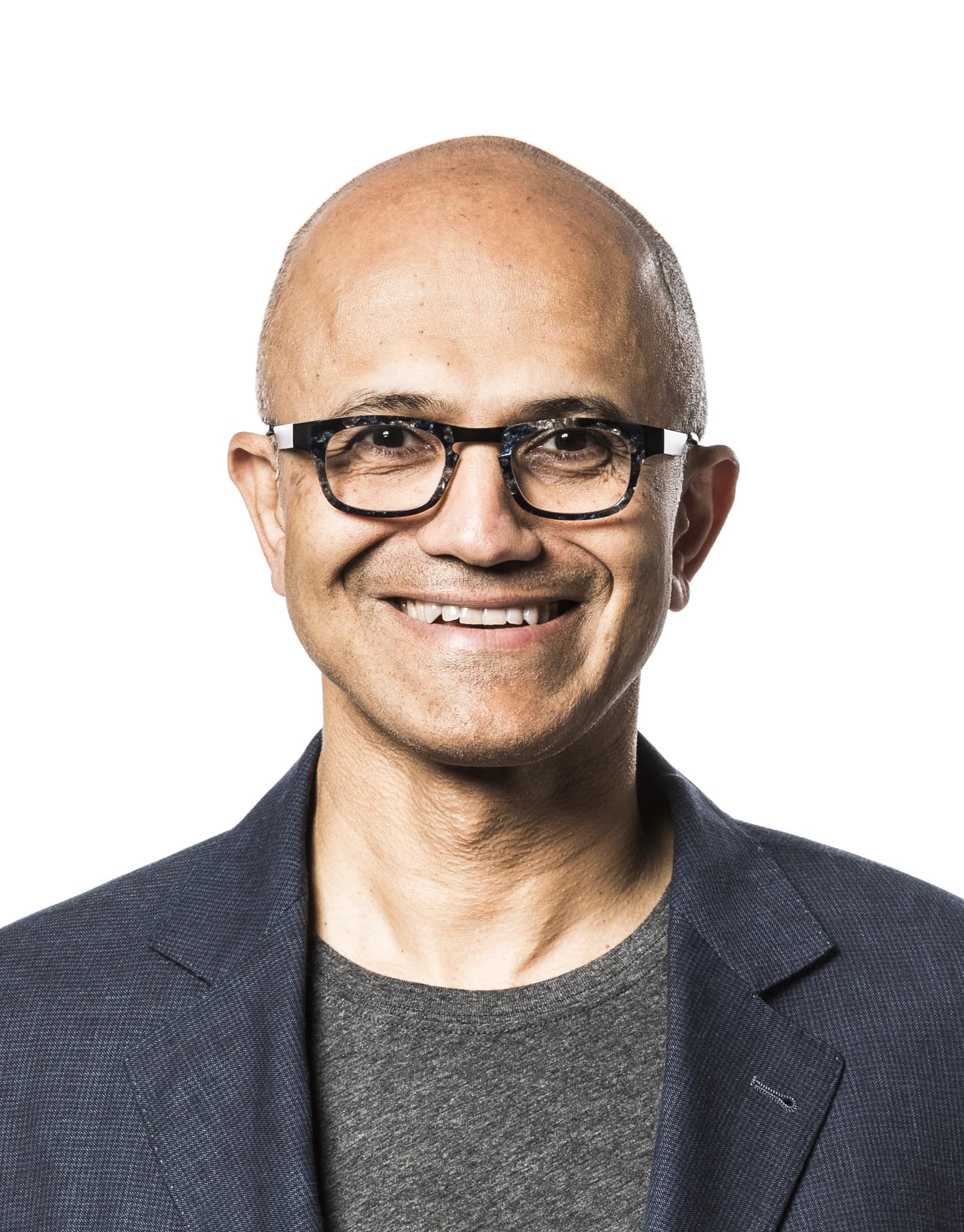 Satya Nadella, Microsoft CEO, looking forward with a smile.