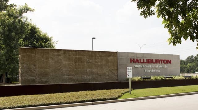 Halliburton sign with company name and address outside the North Sam Houston Parkway East office.