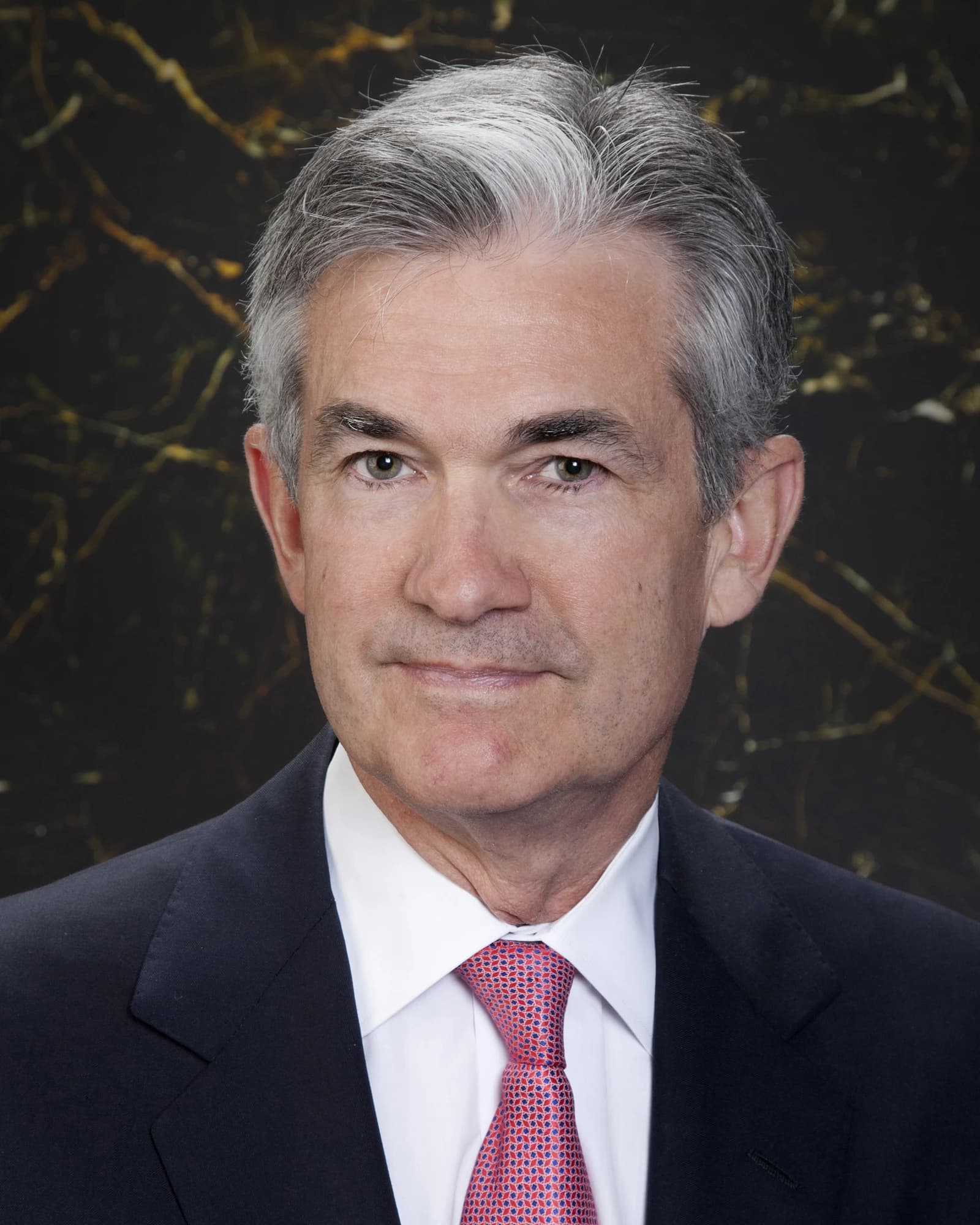Jerome Powell, Chair of the Federal Reserve, looking directly at the camera.