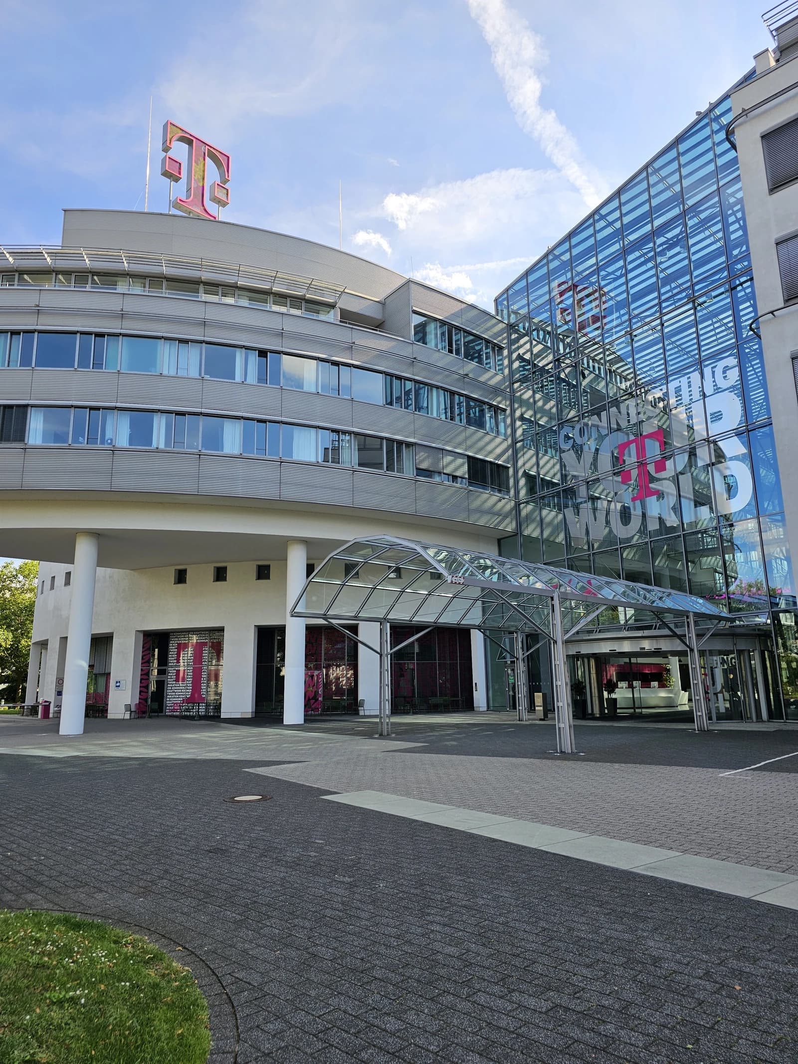 Exterior view of the modern Deutsche Telekom headquarters building in Bonn, Germany.