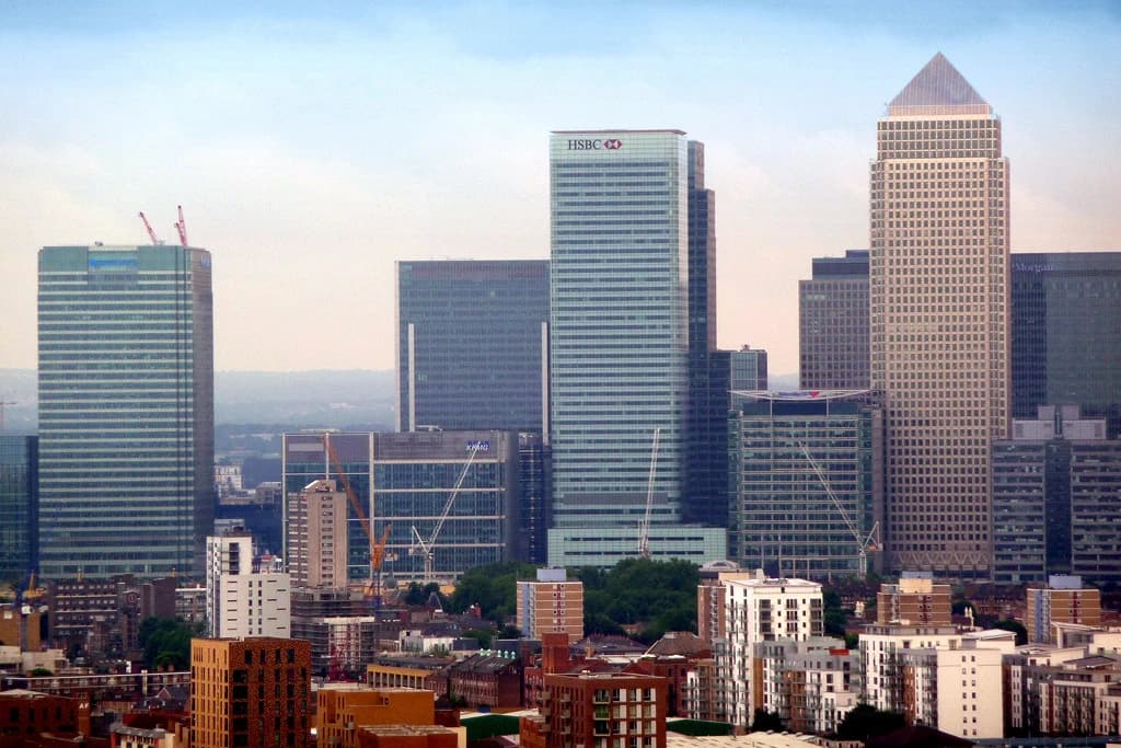 Aerial view of Canary Wharf skyline in London, England, with various skyscrapers.