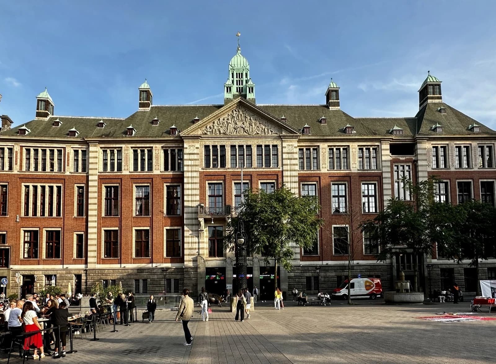 Exterior of the historic Euronext Amsterdam stock exchange building on a clear day.