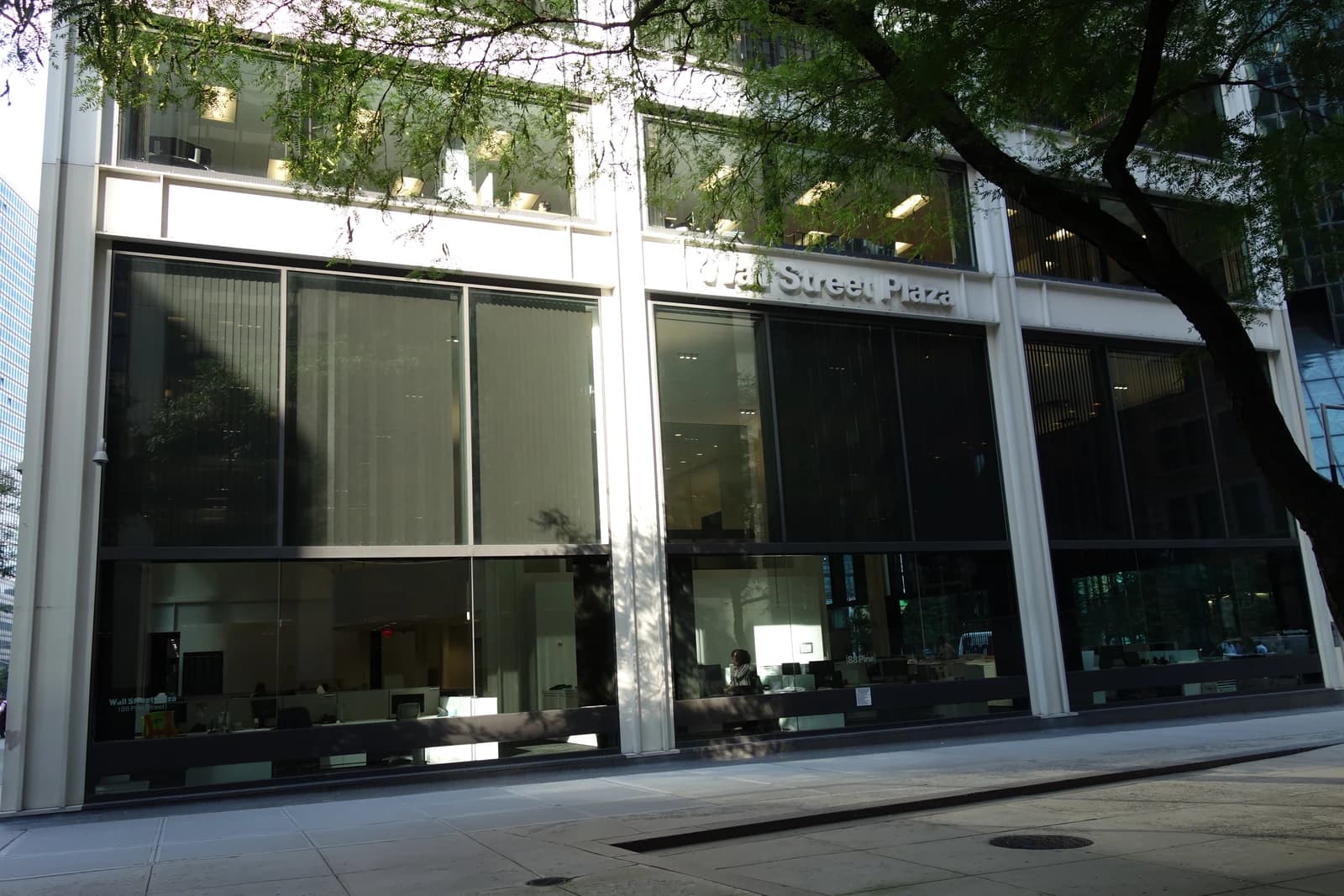 Exterior facade of the Wall Street Plaza building in the financial district.