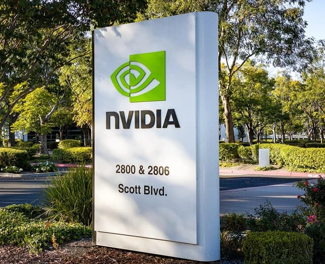 Nvidia sign displaying the company logo and address at an office entrance.