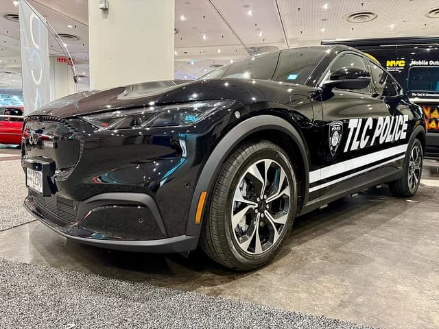 2025 Ford Mustang Mach-E Premium police vehicle, front quarter view.