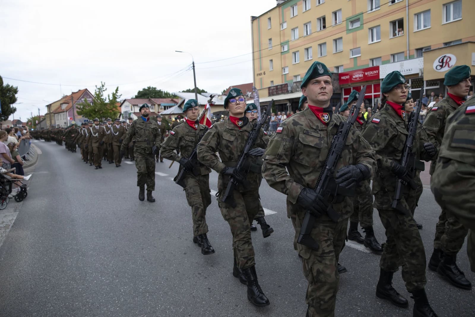 Polish soldiers marching in formation during the Polish Armed Forces Day parade.