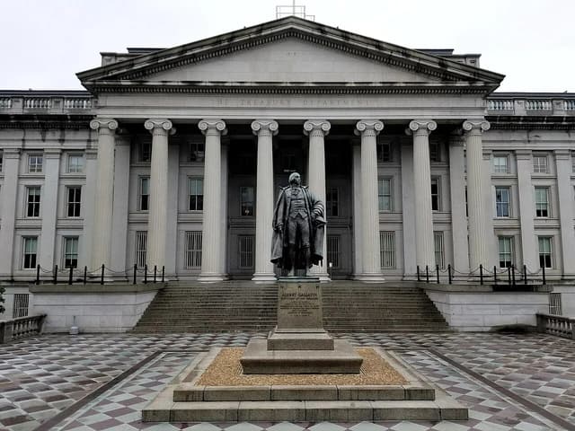 Albert Gallatin statue stands in front of the U.S. Treasury Department building.
