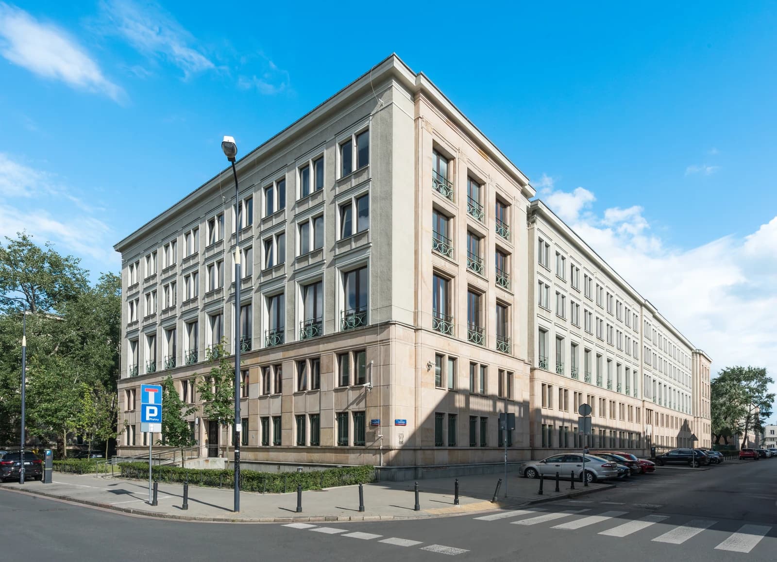 Ministry of Finance building in Warsaw, Poland, under a blue sky.
