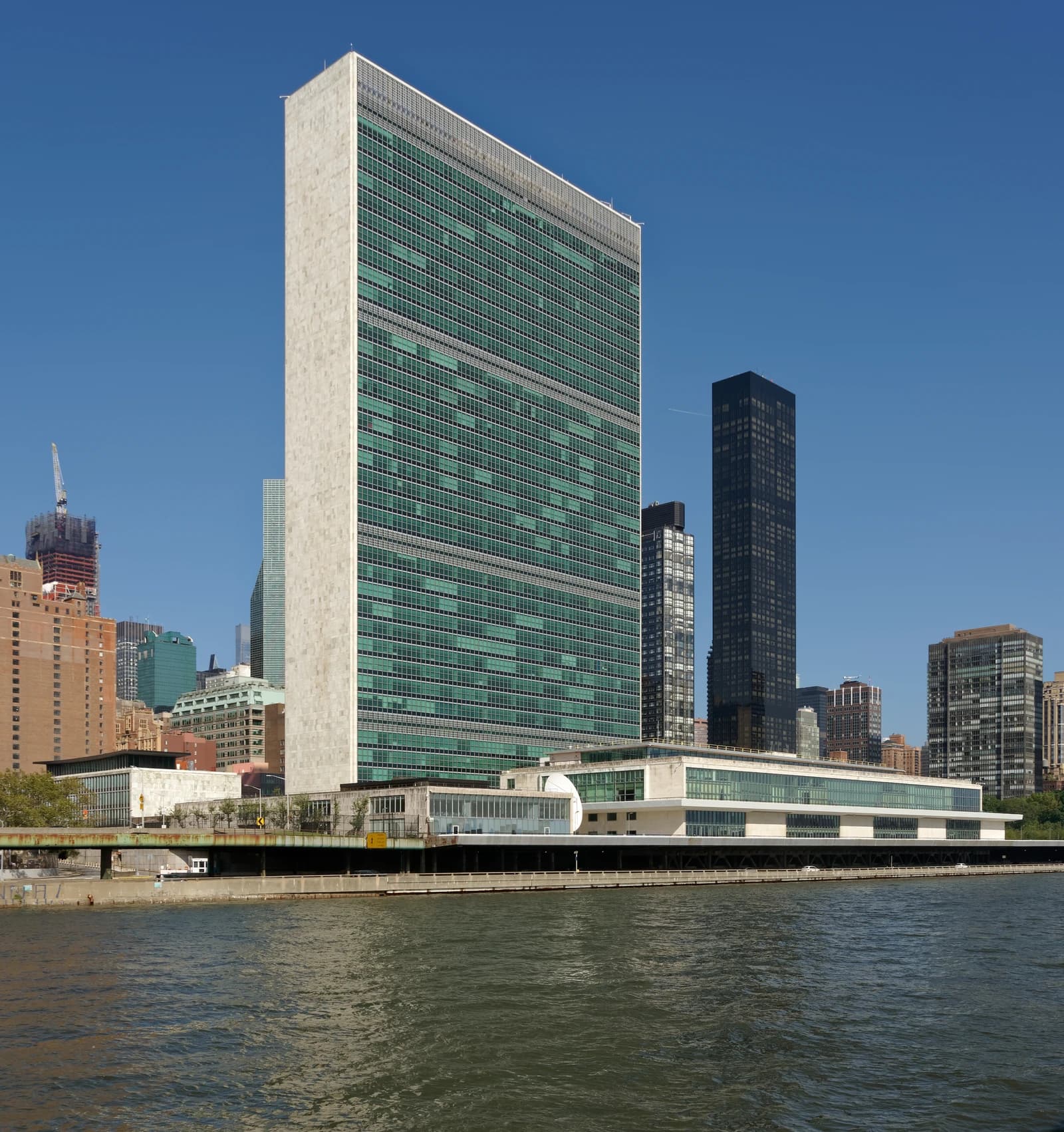 Headquarters of the United Nations building in New York City, seen from across the East River.